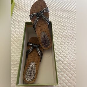 Beautiful NWOT pewter sandals. Never worn